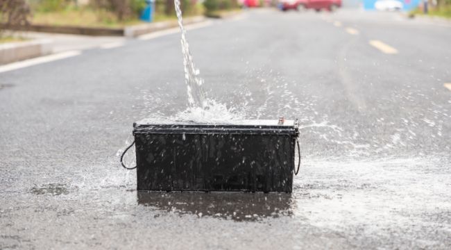 water poured on the battery